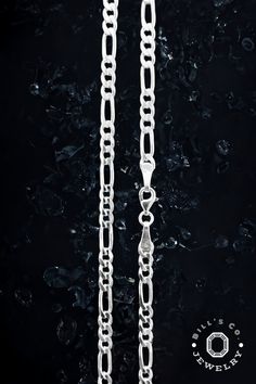 Elevate your wardrobe with the lustrous allure of our 925 Silver Italian Flat Figaro Link Chain Necklace, a true symphony of elegance. Precisely crafted links interlace to form a tapestry of reflective shine, catching the eye with every turn. This necklace transcends the ordinary, offering a timeless aesthetic that complements both the trendsetter and the classic dresser alike. Constructed with premium sterling silver, this necklace not only captivates with its radiant finish but also assures resilience and a lasting gleam. It's not just a piece of jewelry it's a statement of sophistication, a treasure that enhances your presence with a subtle yet unmistakable opulence. The indulgence of exclusivity comes with the promise of swift gratification. The necklace is meticulously prepared for di Classic Dresser, Classic Dressers, Timeless Aesthetic, Link Chain Necklace, Chain Necklaces, 925 Sterling Silver Chain, Silver Chain Necklace, Chain Link Necklace, Necklace Handmade