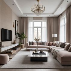 a living room with couches, tables and a tv on the wall in front of a window