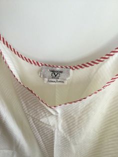 Vintage Valentino Intimo White Chemise nightgown or slip. Neiman Marcus tag No size tag. No fabric content tag.  Presumed to be cotton but may be a blend! Some yellowing.   See photos.  18.5 inch bust, 31.5 inch length.   Straps do not adjust! Please ask questions!  No returns! Sold as is. With flaws. No returns. White Cotton V-neck Sleepwear, Red Cotton Nightgown For Sleepover, Red Cotton Nightgown For Pajama Party, Red Cotton Nightgown For Loungewear, Cotton V-neck Nightgown For Sleepover, Spring Cotton V-neck Nightgown, Cotton V-neck Nightgown For Bedtime, White Cotton Dress For Pajama Party, Red Sleeveless Cotton Sleepwear