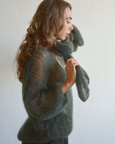 Hello, I'm the one, who won't let you down - khaki green mohair sweater. I will comfort you, keep you warm and will make you smile. I'm 100% hand made and proud of that. I consist of 70% italian kid mohair and 30% of nylon, which makes me incredibly natural. I'm quite unique as could be worn all year long. I'm in one size and one size fits all because my measurements are : ❤️ Width -(under a bra -58 cm, on the bottom -52 cm) ❤️ Lengths -54 cm I'm a unique one, you could were me with open back or Green Mohair Cozy Sweater, Cozy Green Mohair Sweater, Green Mohair Knitted Sweater, Green Mohair Winter Sweater, Oversized Open Knit Green Sweater, One Size Mohair Sweater For Winter, Oversized Green Open Knit Sweater, Stylish Sweater, Mohair Knit