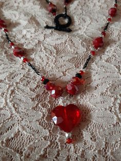 Bead and Chain Red and Black Single Strand Handmade Beaded Necklace with Heart Pendant Heart Shaped Beaded Chain Jewelry For Party, Heart-shaped Beaded Chain Jewelry For Party, Party Beaded Necklaces With Heart Pendant, Heart Beaded Necklaces For Valentine's Day Party, Heart-shaped Beaded Necklace For Parties, Party Beaded Necklace With Heart Pendant, Beaded Chain Jewelry For Valentine's Day Party, Party Heart Pendant Beaded Necklace, Valentine's Day Beaded Chain Party Jewelry