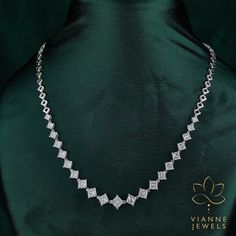 Dive into the realm of unparalleled brilliance and elegance with our stunning 16.16 Total Carat Weight Princess Cut Lab-Grown Diamond Necklace. Crafted with precision and love, each princess-cut diamond showcases a distinct square silhouette known for its sharp angles and beautiful symmetry, embodying both modernity and timeless allure. Not only is the princess cut known for its contemporary charm, but it also exudes a luminous sparkle that's hard to resist. With a total carat weight of 16.16, this necklace guarantees a lavish display of shimmer and sheen with every turn of your neck. Sustainably crafted, these lab-grown diamonds offer the same physical, chemical, and optical properties as mined diamonds. Being ethically sourced and environmentally friendly, they present a conscious choice Luxury Bridal Necklace For Formal Occasions, Luxury White Gold Bridal Necklace, Luxury Bridal Necklace With Vvs Clarity For Anniversary, Luxury Vvs Clarity Diamond Necklace For Wedding, Luxury Bridal Necklace With Vvs Clarity For Formal Occasions, Luxury Bridal Necklace With Diamond Accents, Luxury Bridal Necklace With Diamond Cut For Anniversary, Luxury Diamond White Bridal Necklace, Luxury Bridal Necklace With Single Cut Diamonds For Anniversary