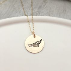 "Runner Gift for Her - Track Necklaces for Seniors - Cross Country Necklace - Running Jewelry 5/8\" hammered gold filled disc is stamped with the running show with wing It hangs from a dainty gold filled cable chain." Track Necklaces, Running Jewelry, Country Necklace, Wing It, Gifts For Runners, Hammered Gold, Cross Country, Cable Chain, Matching Earrings