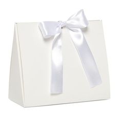 a white gift bag with a ribbon on it