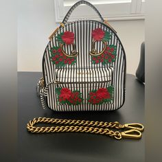 Authentic Like New Versace Women’s Backpack, Comes With Versace Dust Bag And Gold Chain To Carry By Hand. Only Used Once! Purchased In Paris A Few Years Ago. Very Cute And Unique With White & Navy Stripes With Red Flowers. Versace Backpack, Versace Women, Mini Backpacks, Versace Bags, Navy Stripes, Mini Backpack, Red Flowers, Gold Chain, Gold Chains