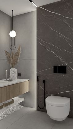 a modern bathroom with marble walls and flooring