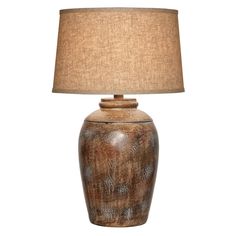 a table lamp with a brown shade on it's base and a beige linen shade