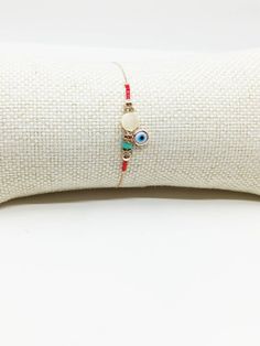 Evil eye Bracelet is adjustable, it fits on any wrist. Evil eye bead on the nazar bracelet is white. There are red miyuki beads on the nazar bracelet. Chain is rose gold. This beaded bracelet with evil eye would be a perfect gift for birthday, Christmas, Valentine's day or Mother's day. For more evil eye bracelets, click the link below; https://www.etsy.com/shop/EyeDesignsbyGG?ref=search_shop_redirect&section_id=30219689 White Beaded Bracelets With Adjustable Chain, Adjustable White Beaded Bracelet, White Friendship Bracelets With Evil Eye, White Beaded Bracelet With Adjustable Chain, White Evil Eye Friendship Bracelets, White Bohemian Evil Eye Bracelet For Friendship, White Beaded Bracelets With Adjustable Chain As A Gift, Bohemian White Evil Eye Bracelet For Friendship, White Bohemian Bracelet With Adjustable Chain