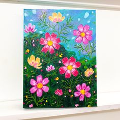 an acrylic painting of pink and yellow flowers