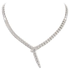 The Following Item we are offering is a Rare Important Radiant 18KT Gold Rare Gorgeous Fancy Diamond Serpent Snake Necklace. Necklace is comprised of a Gorgeous Array of 168 Fancy Round Diamonds!!! T.C.W. Over 4CTS!!! This Gorgeous Necklace is a Rare Sample Piece from a Private Manufacturer that sold to Important 5 Star Hotel and Fine Jewelry Stores. New With Tags $37, 500.00!! Serpent Snake, 5 Star Hotel, Snake Necklace, Fancy Diamonds, Gorgeous Necklaces, Jewelry Stores, Round Diamonds, Choker Necklace, Fine Jewelry