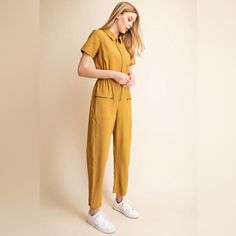 Mustard Utility Jumpsuit Featuring Front Zipper Closure And Pockets, Elastic Waistband, Tailored Fit, And Collar Neckline Inseam: 27” Pit To Pit: 18” Nwot (11) Casual Yellow Jumpsuits And Rompers For Work, Utility Jumpsuit, Pocket Jumpsuit, Black And White Shorts, Juicy Couture Charms, Rayon Pants, Linen Skirt, Distressed Black Jeans, Long Sleeve Romper