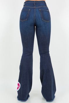 Upgrade your denim wardrobe with our Sweetheart Bell Bottom Jean in Dark Denim! These trendy jeans feature a flattering design with a front button and zipper closure, convenient front and back pockets, and adorable patch and charm accents. Made with premium fabrics in the USA, you can rely on their high-quality.DRY CLEAN ONLY. Silhouette: Bell bottom Fit: High Rise Embellishment: Patches, charms Length: Full Length Closure: button, zipper Made In: USA Fabric Contents: 98% Cotton, 2% Spandex Stre Trendy Flare Jeans With Button Zip Fly For Fall, Trendy Fall Flare Jeans With Button Zip Fly, Fall Denim Flare Jeans, Dark Wash Mid-rise Flare Jeans With Button Zip Fly, Trendy Mid-rise Flare Jeans With Button Zip Fly, Trendy Flare Jeans With Zipper Closure For Fall, Stretch Denim Flare Jeans With Button Closure, Trendy Dark Wash Jeans With Zipper Closure, Trendy Cotton Jeans With Zipper Closure