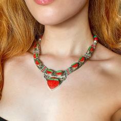 Embrace your inner bohemian goddess and make a statement that's uniquely you with this bold and beautiful tribal ethnic necklace. Add it to your collection today, and let the adventure begin! Featuring alluring blue and green Turquoise and deep red Coral, this handcrafted necklace is a true celebration of color and texture. Each gemstone is carefully selected for its unique beauty, creating a harmonious blend that speaks to the soul of the free-spirited and the adventurous! Crafted with a blend Unique Boho Collar Jewelry As Gift, Unique Boho Collar Jewelry, Unique Boho Collar Jewelry For Festival, Bohemian Jewelry With Natural Stones For Rituals, Bohemian Jewelry With Boho Collar As A Gift, Bohemian Silver Turquoise Necklace For Festivals, Silver Bohemian Turquoise Necklace For Festivals, Red Bohemian Jewelry For Festival, Red Bohemian Festival Jewelry