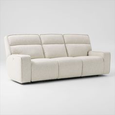 the reclining sofa is white and has two rows of seats on each side,