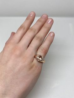 This stunning rose gold morganite and diamond ring is a modern update on the classic signet pinky ring. Featuring a beautiful peach hued oval morganite and 6 sparkling white diamonds all bezel set in a high polished rose gold setting, this ring adds some elevated glamor and a modern refresh to the classic pinky ring. All our gemstones are carefully selected for their color and quality of gemstone. Designed and Handcrafted in NYC by our team of master jewelers. US size 6- Free Sizing available. C Round Rose Gold Signet Ring With Gemstone, Rose Gold 14k Gemstone Signet Ring, Rose Gold Signet Ring With Gemstone, Rose Gold Gemstone Signet Ring, Rose Gold Oval Signet Ring With Gemstone, Oval Rose Gold Signet Ring Fine Jewelry, Oval Rose Gold Signet Ring With Gemstone, Rose Gold Oval Signet Ring In Fine Jewelry Style, Oval Rose Gold Signet Ring In Fine Jewelry Style