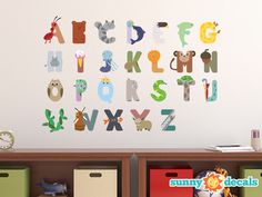 an alphabet wall decal with animals and letters