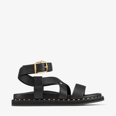 The Blaise sandal is an elevated update to a weekend and vacation wardrobe classic. Crafted from smooth leather with crossover straps, this design is complemented by a faceted Diamond buckle and studs in a gold finish. A moulded rubber sole makes them a versatile choice in your off-duty looks.