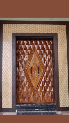 a wooden door with an intricate design on it