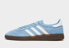 Back from '79, these men's Handball Spezial trainers from adidas Originals stay true to the OG. In a Light Blue colourway, these low-profile sneakers have a premium pigskin nubuck upper with a tonal lace up fastening to lock you in. They're equipped with an Ortholite sockliner to keep you comfy, and feature a gum rubber midsole with a grippy tread for traction. With serrated 3-Stripes in white to the sidewalls, these throwback trainers are finished with a golden Spezial wordmark to the sidewalls and branding to the tongue.|BD7632 Adidas Spezial, West Ham United, Air Max 95, Jacksonville Jaguars, Pig Skin, Adidas Samba Sneakers, Stay True, Adidas Gazelle, Jd Sports