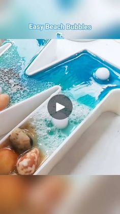 the video is showing how to use an easy beach bubbler for soapy bubbles