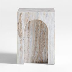 a marble block with an arch in the middle on a white background, there is no image here to provide a caption for