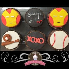 six decorated cupcakes in the shape of superhero characters with names and designs on them