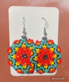 These beautiful Large Summer Huichol style earrings will bring style to any outfit. They are Unique and Gorgeous and perfect for wearing any time you like  They are made with excellent quality Miyuki delica beads and are a size 11.0 bead.  They are sewn together using special high quality thread by myself.    If you have a question you can message me I would be happy to help Multicolor Beaded Crystal Earrings Gift, Colorful Round Beaded Earrings, Multicolor Beaded Crystal Earrings, Multicolor Round Beads Crystal Earrings, Multicolor Round Beaded Crystal Earrings, Multicolor Crystal Earrings With Round Beads, Beaded Flower Earrings Gift, Round Beaded Flower Earrings For Gifts, Multicolor Round Beads Crystal Earrings For Pierced Ears