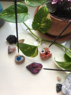 trio of random incense holders, including a small cute face, a big blue eye and purple/pink lips. face : 2 in wide 1.5 in tall (holds incense up) lip : 2in wide and 1.5 tall (holds incense slanted) blue eye : 1.5 in wide and 1.5 tall (holds incense up) Incense Holder Clay, Clay Incense, Air Dry Clay Ideas, Dry Clay Ideas, Big Blue Eyes, Incense Holders, Blue Eye, Incense Holder, Pink Lips