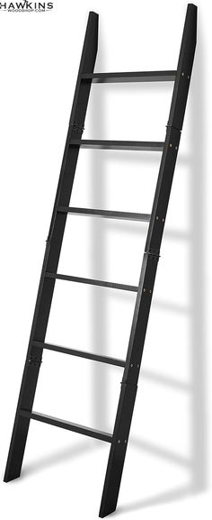 a black ladder leaning up against a white wall with the words hamkins on it