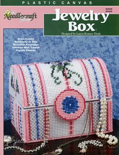 the cover of a plastic canvas jewelry box