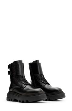 A treaded lug sole and decorative shaft strap bring a bold kick to the classic military boot. 6 1/4" shaft Lace-up style; side zip closure Leather upper and lining/synthetic sole Made in Portugal Utility Styling, Chunky Leather Boots, Chunky Combat Boots, Sacs Tote Bags, Boots Fit, Leather Boots Black, Punk Aesthetic, Womens Combat Boots, Trainer Heels