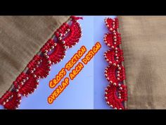 an image of some red beads on fabric