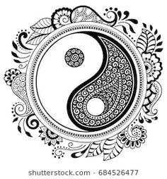 the yin symbol in black and white with an intricate design on it's side