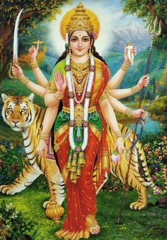 the hindu goddess standing in front of a tiger