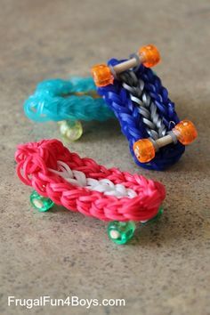 there are three small braided toys on the table