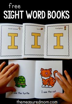 two children's hands holding an open book with the word i in it