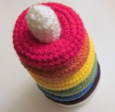 there is a small crocheted object on top of each other