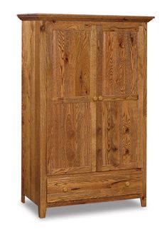 an oak armoire with four doors and three drawers