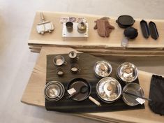 an assortment of cooking utensils are on display