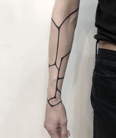 a person with a tattoo on their arm