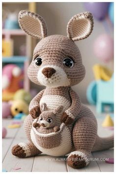 a crocheted kangaroo and her baby