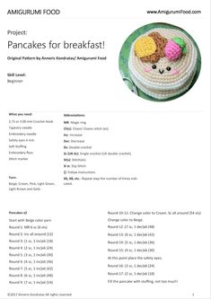 a cake with two crocheted cats on top of it and the words pancakes for breakfast written below