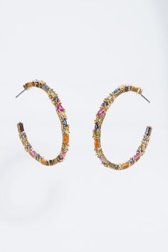 Add some sparkle to your look while sipping your favorite elixir when wearing the Happy Hour Hoops! These ultra lightweight hoop earrings feature hand selected jewel tone gemstones encrusted on all sides - so you can see your favorite gemstones from every angle. Ideal for adding the perfect finishing touch to any special event! 1.50” hoop, 14k gold plated post, hypoallergenic Multicolor Multi-stone Hoop Earrings, Multicolor Multi-stone Hoop Jewelry, Bee Gifts, Summer Earring, Gift Card Sale, Fine Jewellery Necklace, Jewel Tones, The Happy, Happy Hour