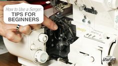 a person working on a sewing machine with a sign that says how to use a singer tips for beginners