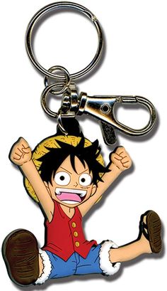 one piece keychain with an image of gohan holding his hands in the air