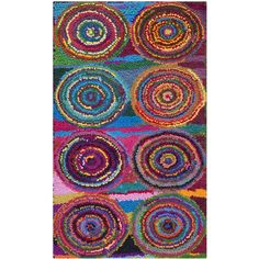 a colorful rug with circles on it