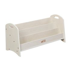 a white wooden toy shelf with two shelves on each side and the bottom section open