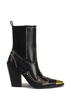 Elevate your style with the TORRIN-BLACK STUDDED ANKLE BOOTIE. This pointed toe bootie features faux leather, western-inspired design, and gold hardware and studded embellishments. With its sleek and edgy look, this bootie is the perfect way to add a fun flare to any outfit.  Shaft Height: 6.5" Opening Circumference: 13" Heel Height: 4.5" Formal Boots, Elegant Studded Heeled Boots With Pointed Toe, Edgy Western Style, Chic Studded Pointed Toe Boots, Glamorous Studded Pointed Toe Boots, Studded Fitted Ankle Boot Heels, Edgy Studded Pointed-toe Boots, Womens Fall Boots, Rocker Chic Style