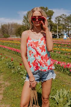 Stay flirty all summer long in our beautiful light turquoise hued 'Driving Down Sunset' shift tank featuring lightweight material a patterned with a pretty coral hued floral print, a scooped neckline with spaghetti straps, and a relaxed silhouette that falls into a straight hemline! Measurements S : Bust 34", Hip 34", Length 22.5", Waist 34". M : Bust 36", Hip 36", Length 23", Waist 36". L : Bust 38", Hip 38", Length 23.5", Waist 38". Spring Casual Tank Top With Adjustable Straps, Casual Spring Tank Top With Adjustable Straps, Summer Tank Top With Adjustable Straps For Spring, Spring Tank Top With Adjustable Straps, Summer Beach Camisole In Red, Red Summer Camisole For Beach, Red Summer Camisole For The Beach, Spring Vacation Tank Top With Spaghetti Straps, Spring Beach Tank Top With Adjustable Straps