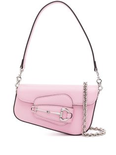 light pink calf leather textured finish asymmetric design signature Horsebit detail logo-engraved silver-tone hardware front flap closure single detachable top handle detachable chain-link shoulder strap main compartment internal logo patch silver-tone hardware cotton lining This piece comes complete with a protective dust bag. We've partnered with Good On You — an independent agency that rates how brands perform in relation to their impact on the planet, people and animals, with a multi-criteri Pink Top Handle Shoulder Bag With Logo Hardware, Modern Pink Shoulder Bag With Logo Hardware, Pink Formal Bag With Logo Hardware, Formal Pink Bag With Logo Hardware, Pink Gucci Bag With Branded Hardware, Gucci Pink Top Handle Shoulder Bag, Gucci Mini, Gucci Horsebit, Chanel 2